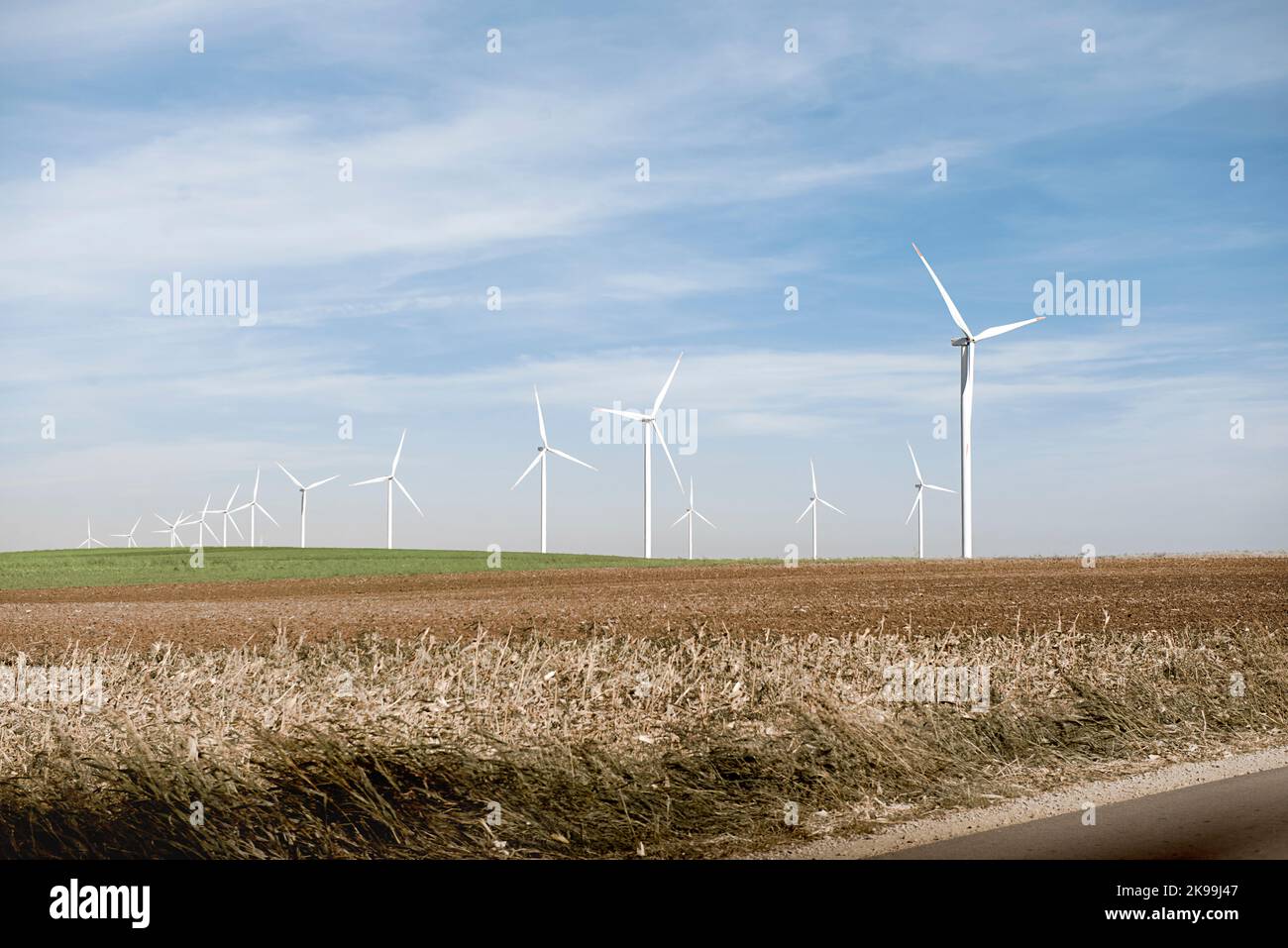 Renewable energy wind turbines in wind farm Stock Photo