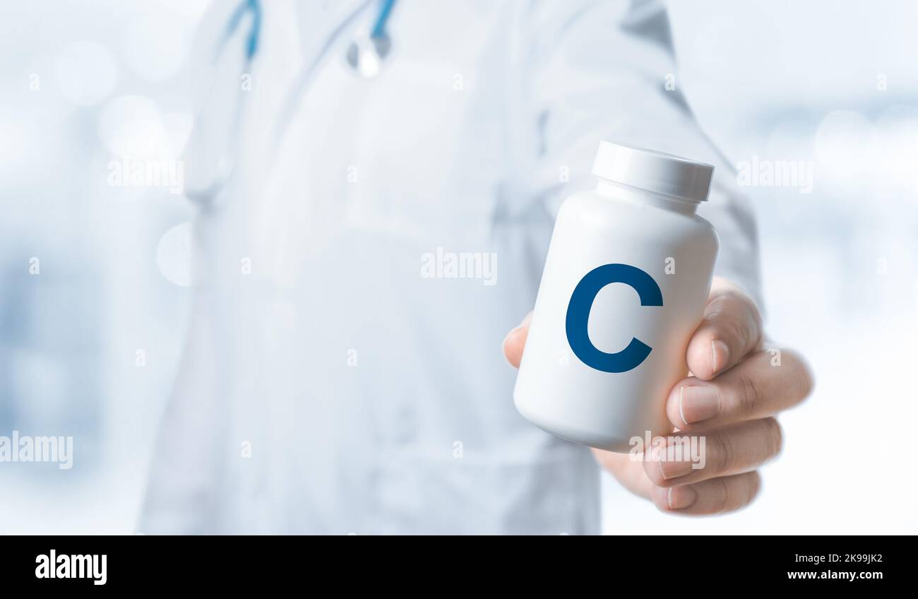 C vitamin, C supplements for human health. Doctor taking