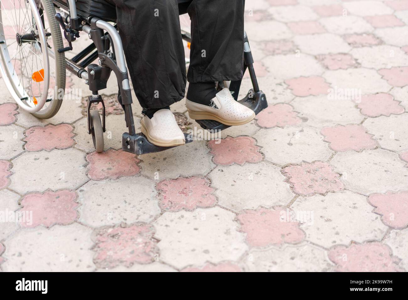 Woman who uses a wheelchair hi-res stock photography and images - Alamy