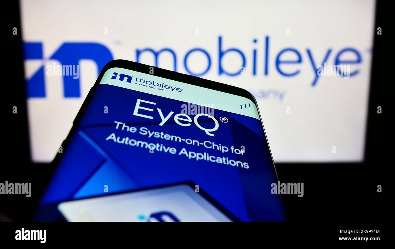 Mobile phone with webpage of Israeli autonomous driving company