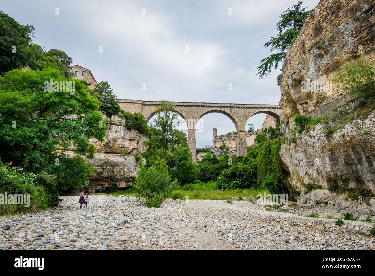 View on the Cesse river, the bridge, the 'Grand Pont Naturel' cave and the medieval village of Minerve in the South of France (Herault) Stock Photo