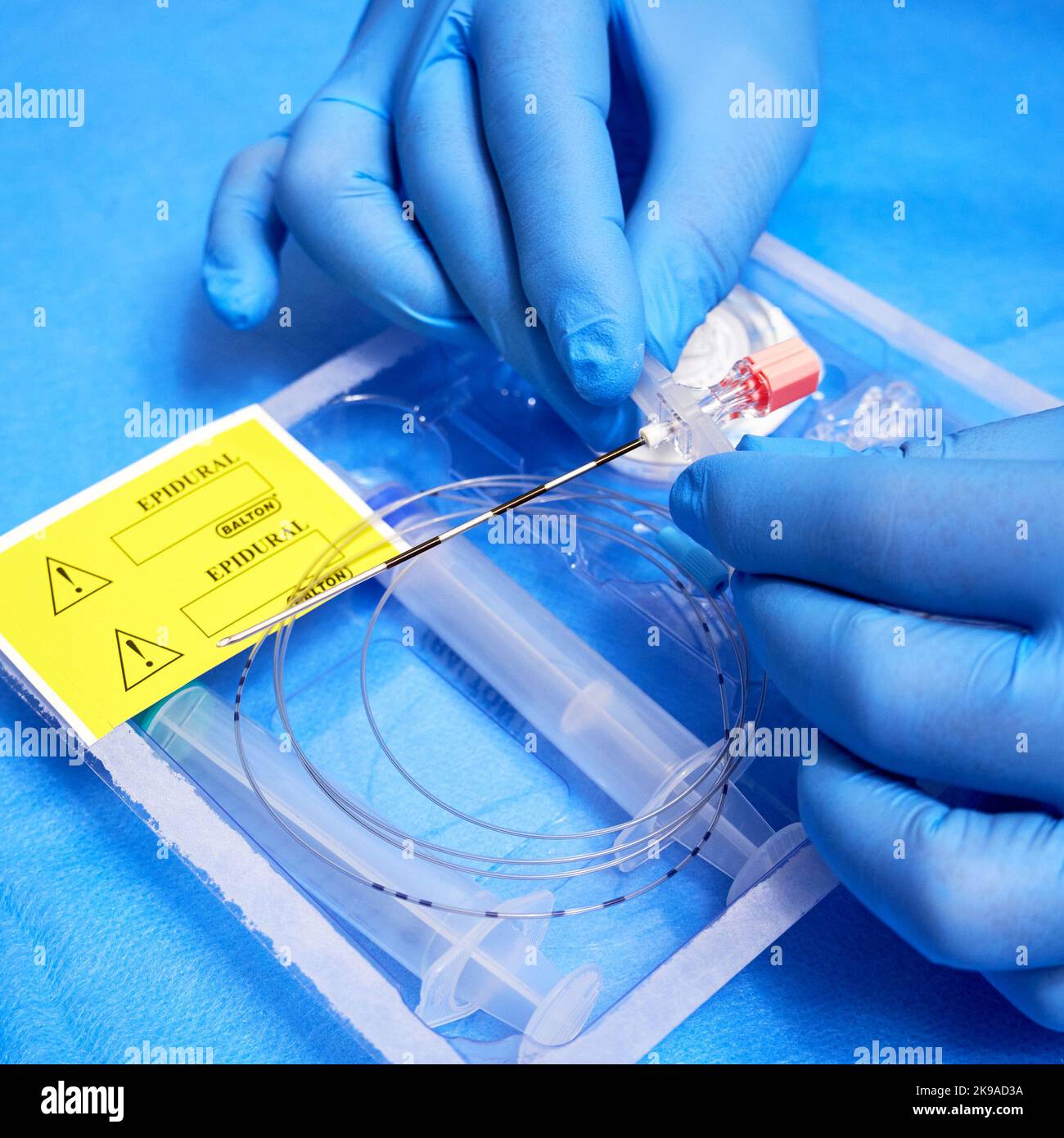 Medic's hands in gloves and epidural anesthesia kit Stock Photo Alamy