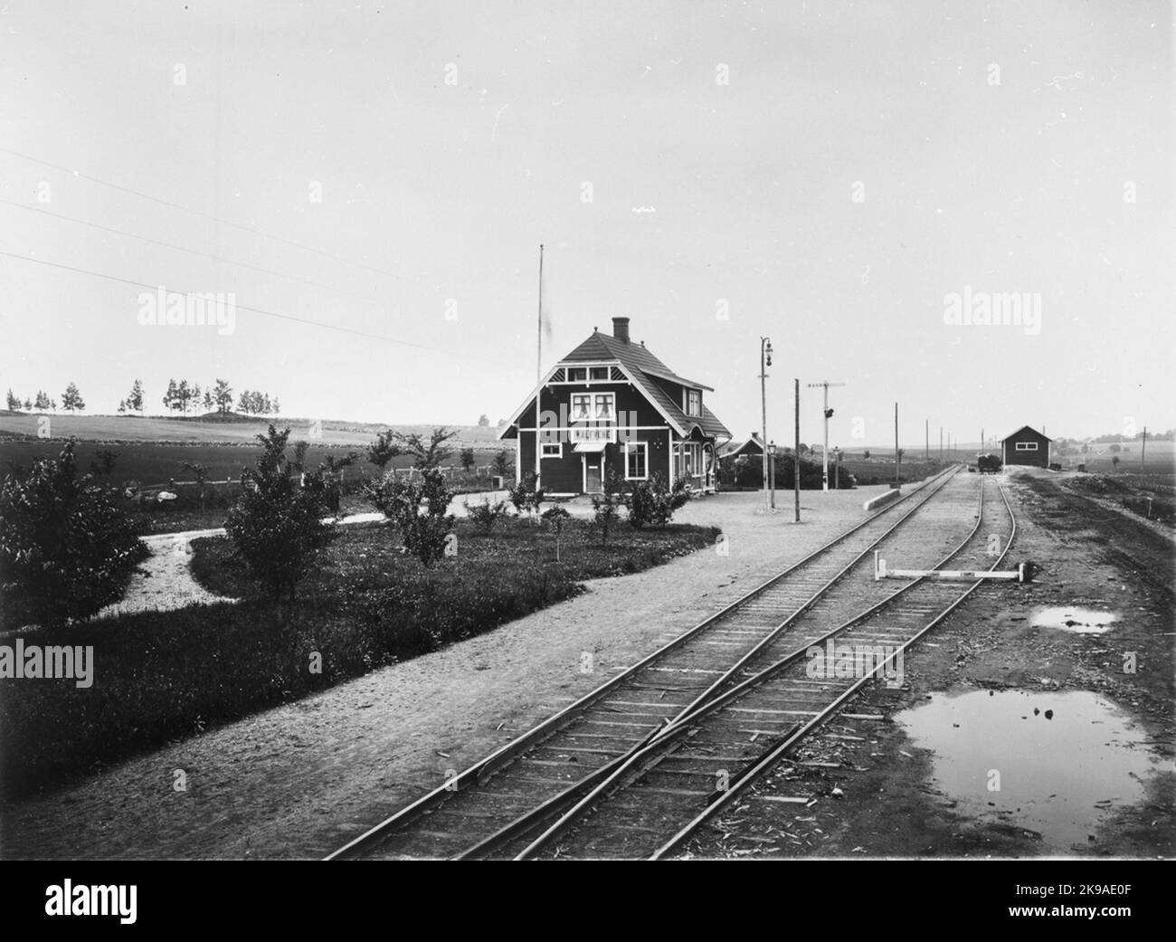 A barrier boom, the precursor to today's track barrier, over one track Stock Photo
