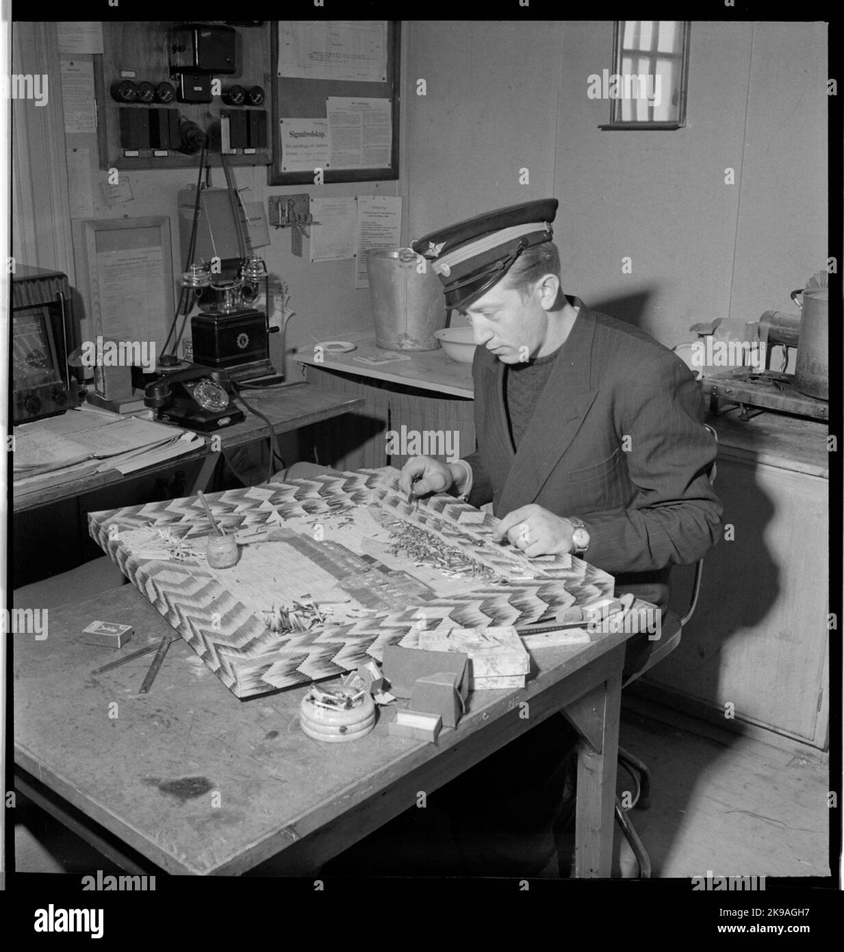 Personnel make a painting of matches Stock Photo Alamy