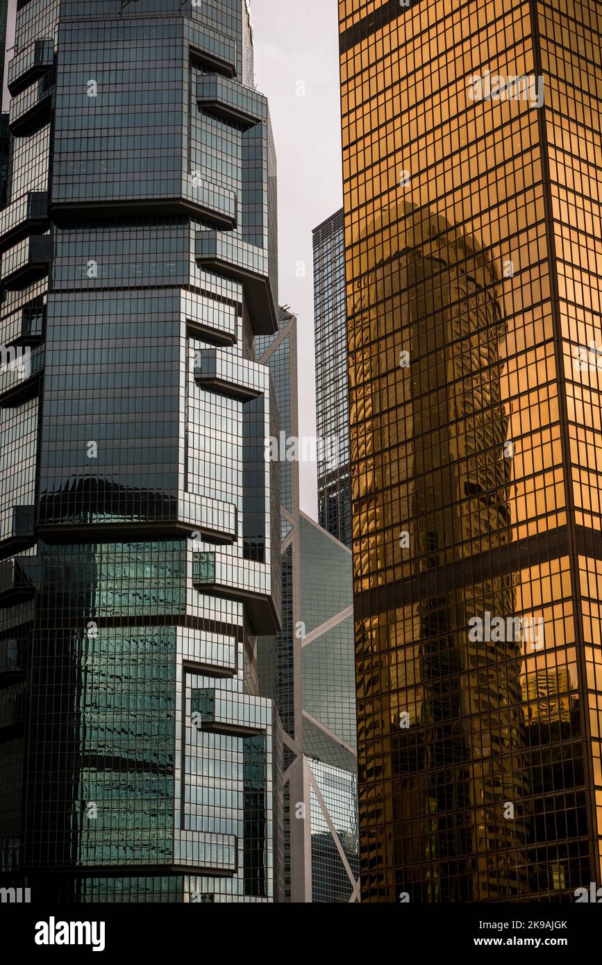 Detail of the glass façades of the Lippo Centre and the Far East Finance Centre, skyscrapers in Admiralty, Hong Kong Island Stock Photo