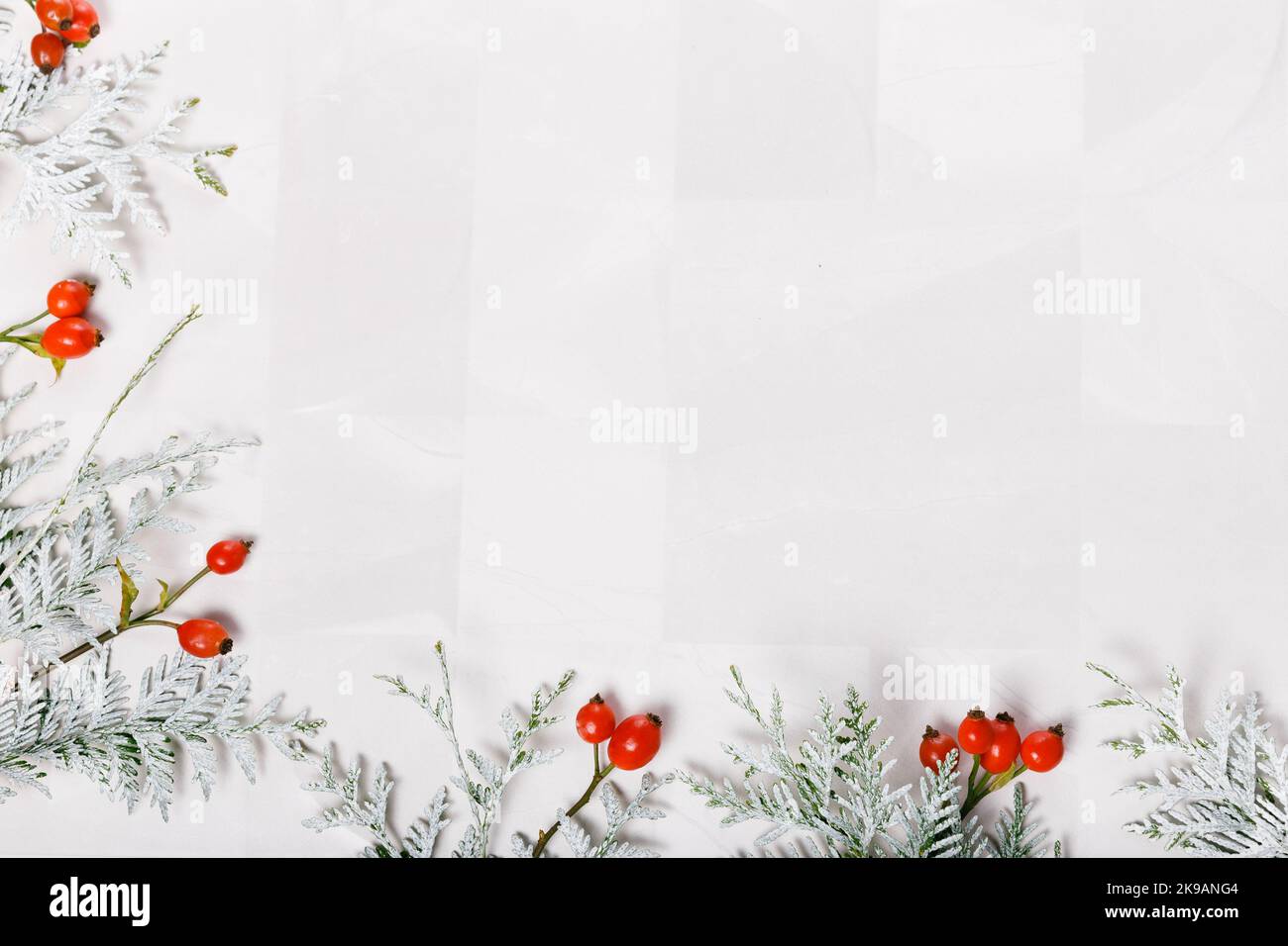 Christmas decoration marble background top view. Merry Christmas greeting card, frame. Winter xmas holiday theme. Stock Photo