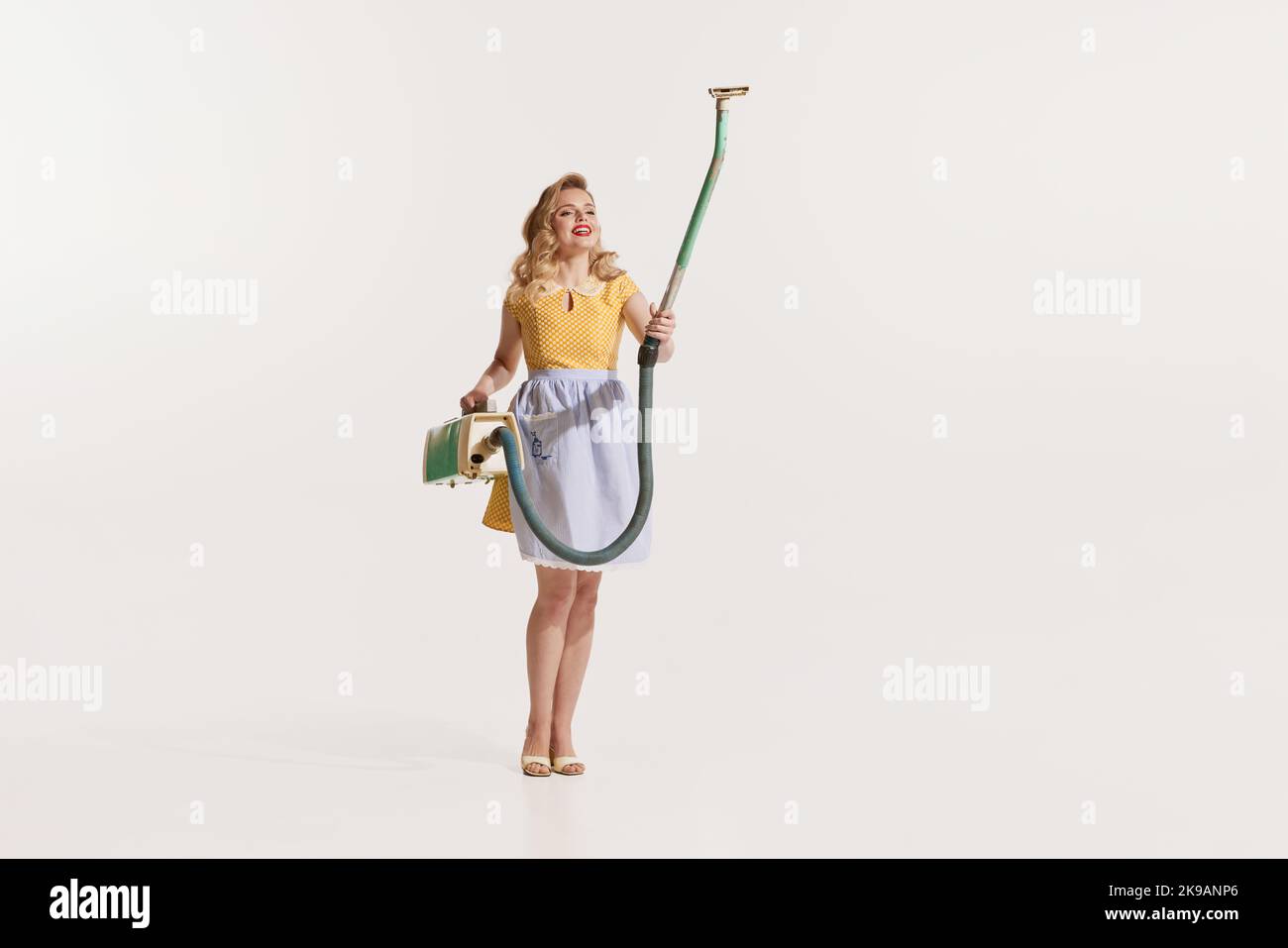 Portrait of young, elegant blonde girl with beautiful hairstyle and