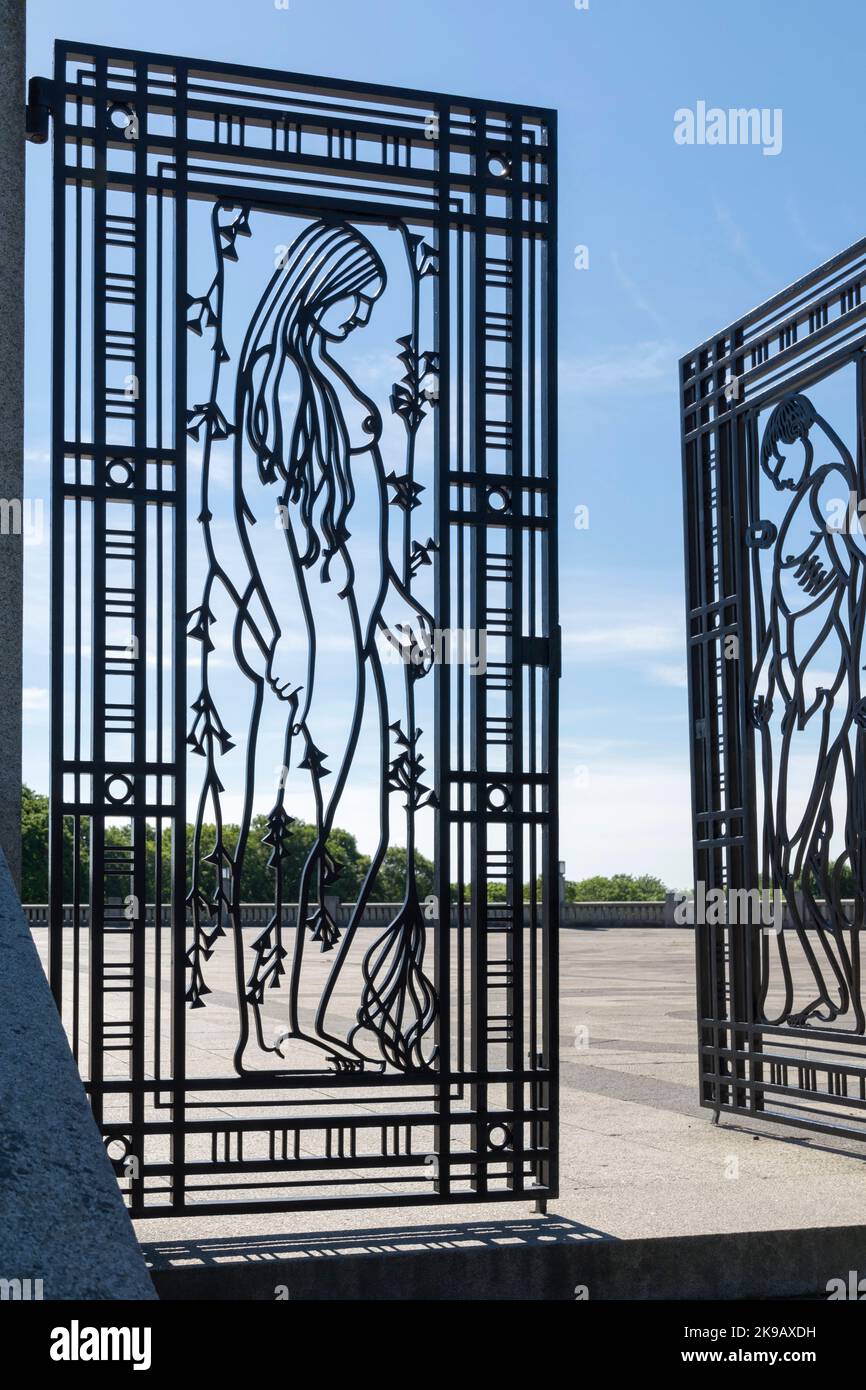 A halfopen wrought iron gate in Vigeland Sculpture Park invites to