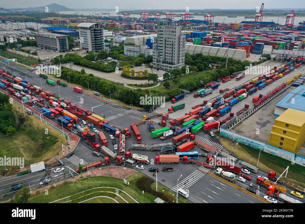 NANJING, CHINA - OCTOBER 27, 2022 - Aerial photo shows container trucks ...