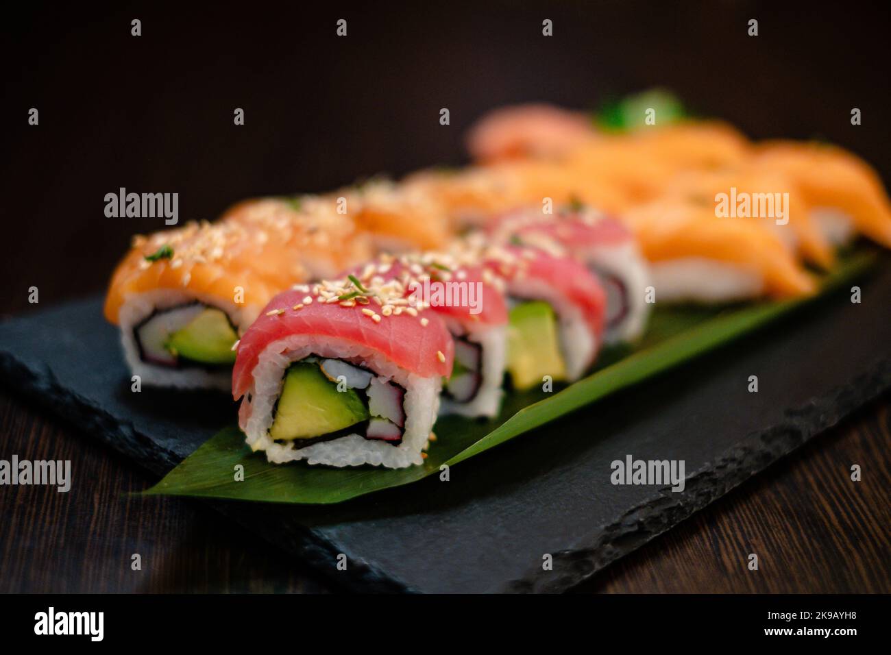 Avocado Salmon Sushi Stock Photo - Alamy