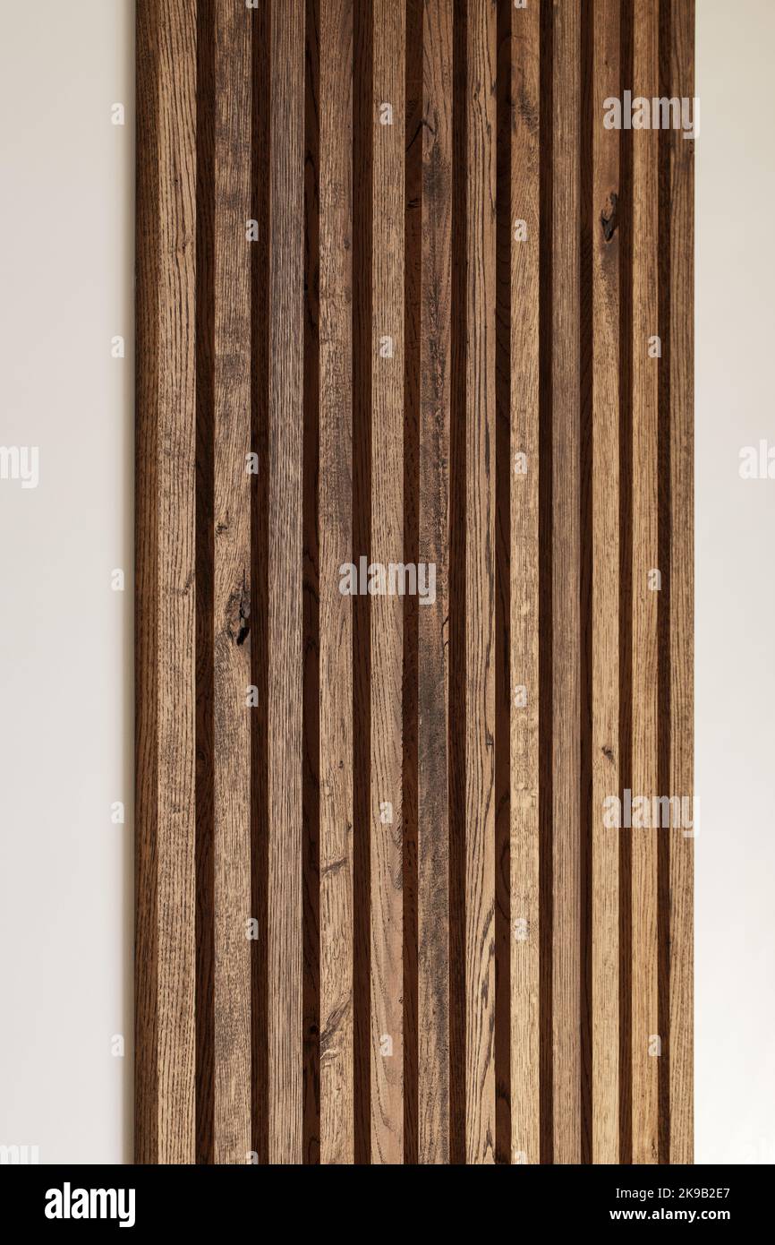 Solid oak wood wall decoration with imperfections. Japandi concept Stock Photo
