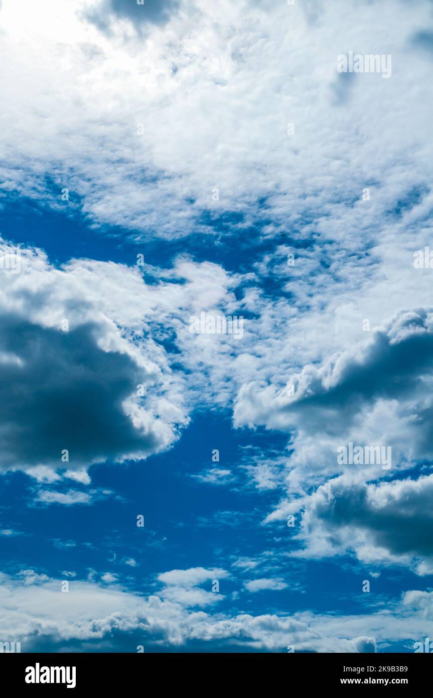 Sky background, blue vast sky landscape panoramic scene with dramatic fluffy clouds Stock Photo