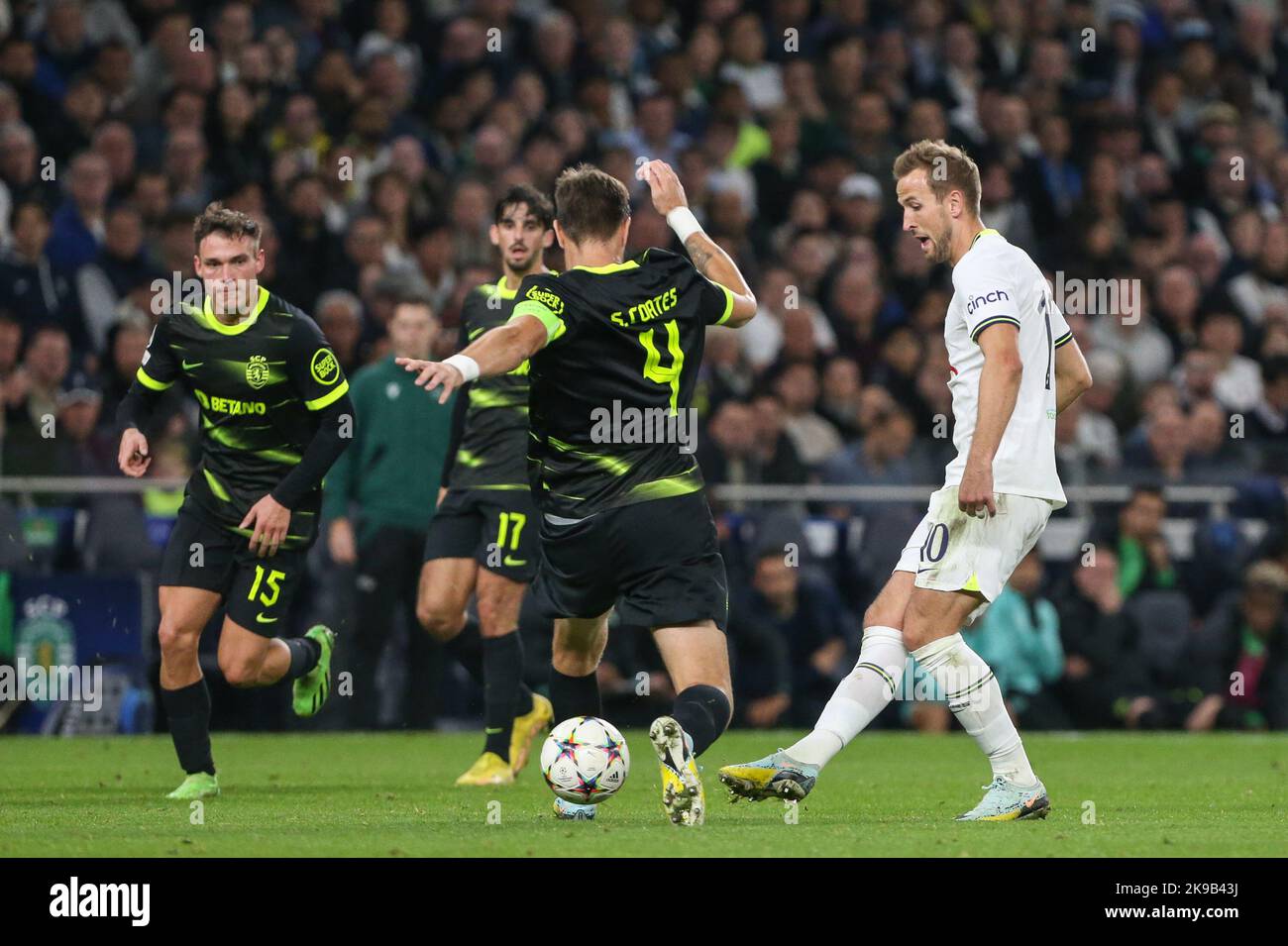 London, UK. 26th Oct, 2022. Harry Kane #10 of Tottenham Hotspur passes the ball through the legs of Sebastián Coates #4 of Sporting Lisbon during the UEFA Champions League match Tottenham Hotspur vs Sporting Lisbon at Tottenham Hotspur Stadium, London, United Kingdom, 26th October 2022 (Photo by Arron Gent/News Images) Credit: News Images LTD/Alamy Live News Stock Photo