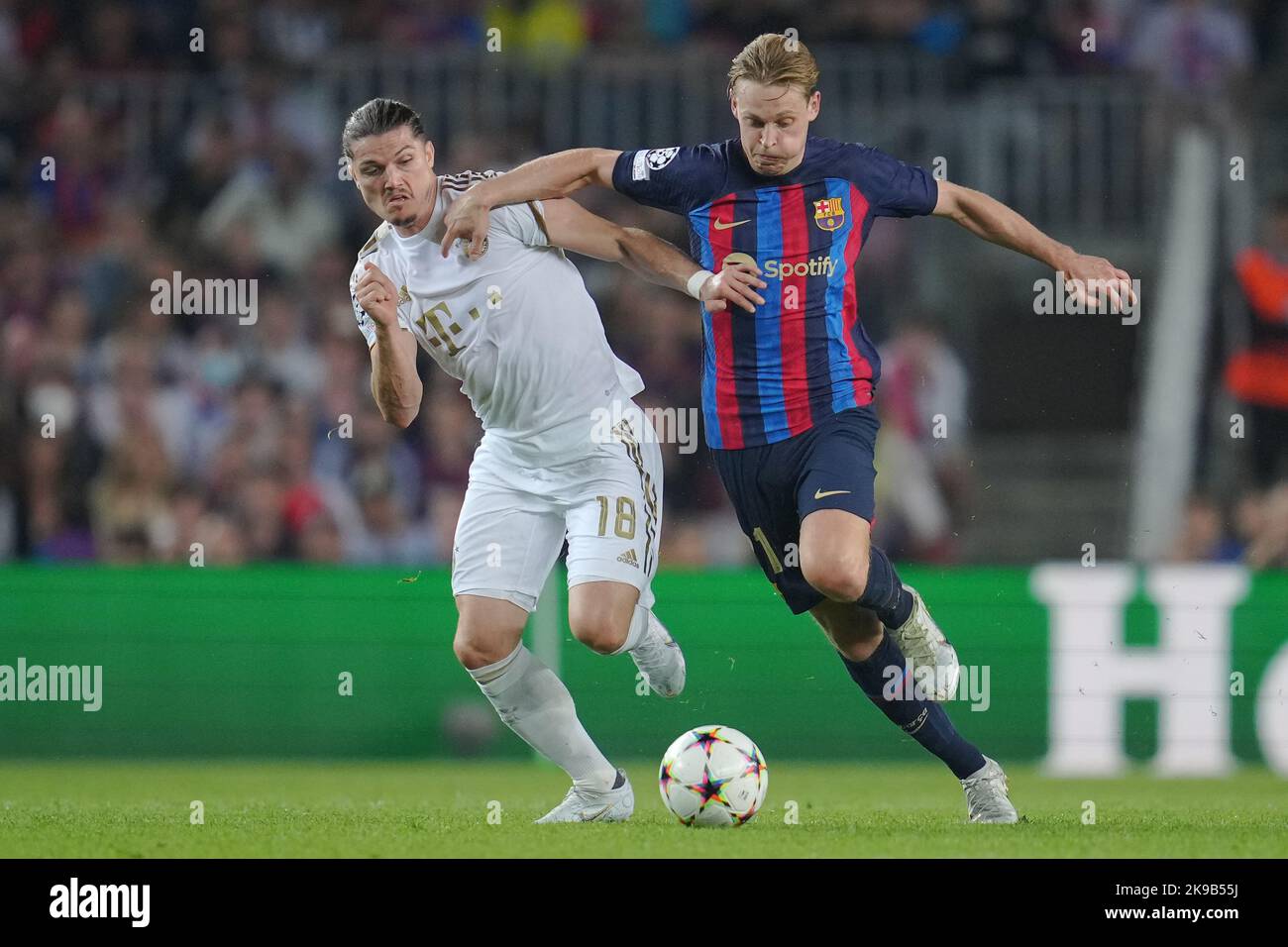 Barcelona, Spain. October 26, 2022, Frenkie de Jong of FC Barcelona and Marcel Sabitzer of FC Bayern Munich during the UEFA Champions League match, group C between FC Barcelona and Bayern Munich played at Spotify Camp Nou Stadium on October 26, 2022 in Barcelona, Spain. (Photo by Bagu Blanco / PRESSIN) Stock Photo