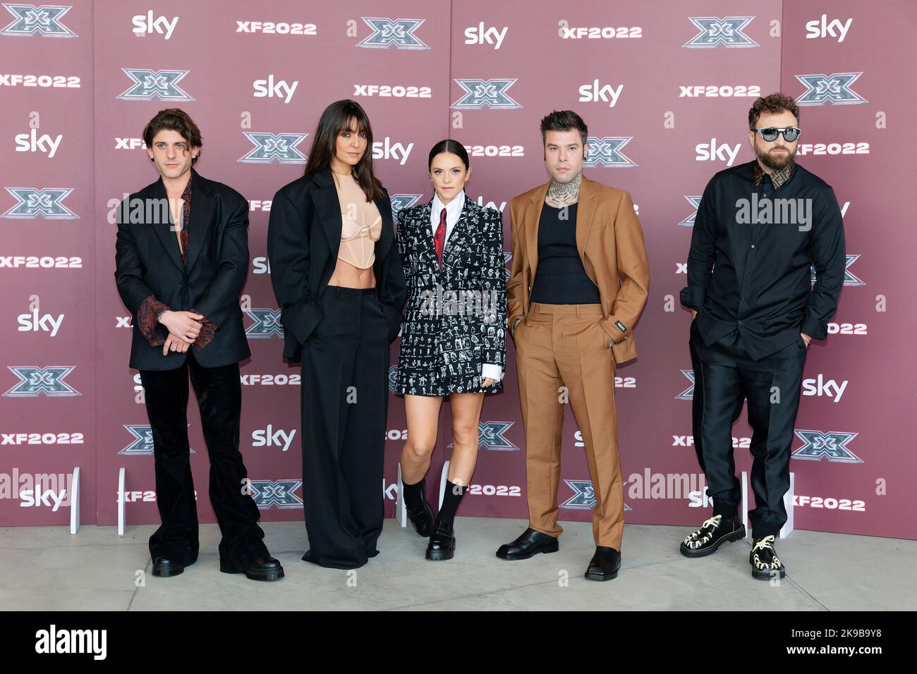 MILANO, ITALY - OCTOBER 25: Rkomi, Ambra Angiolini, Francesca Michielin, Fedez, Dargen D'Amico attend the X Factor Live Photo-call at Repower Theatre Stock Photo