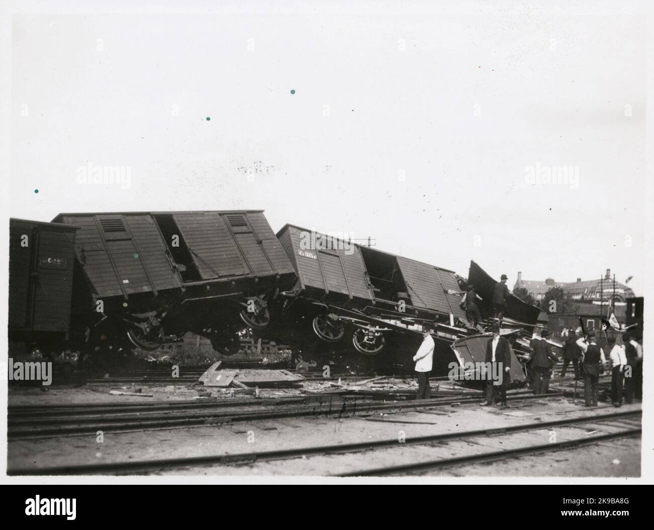 Exploded Wagons Freight wagons and crowd at yard after train accident Stock Photo - Alamy