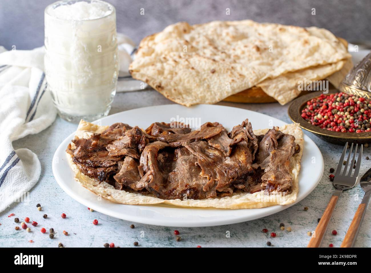 Turkish meat doner on gray background. Traditional flavors. Doner kebab