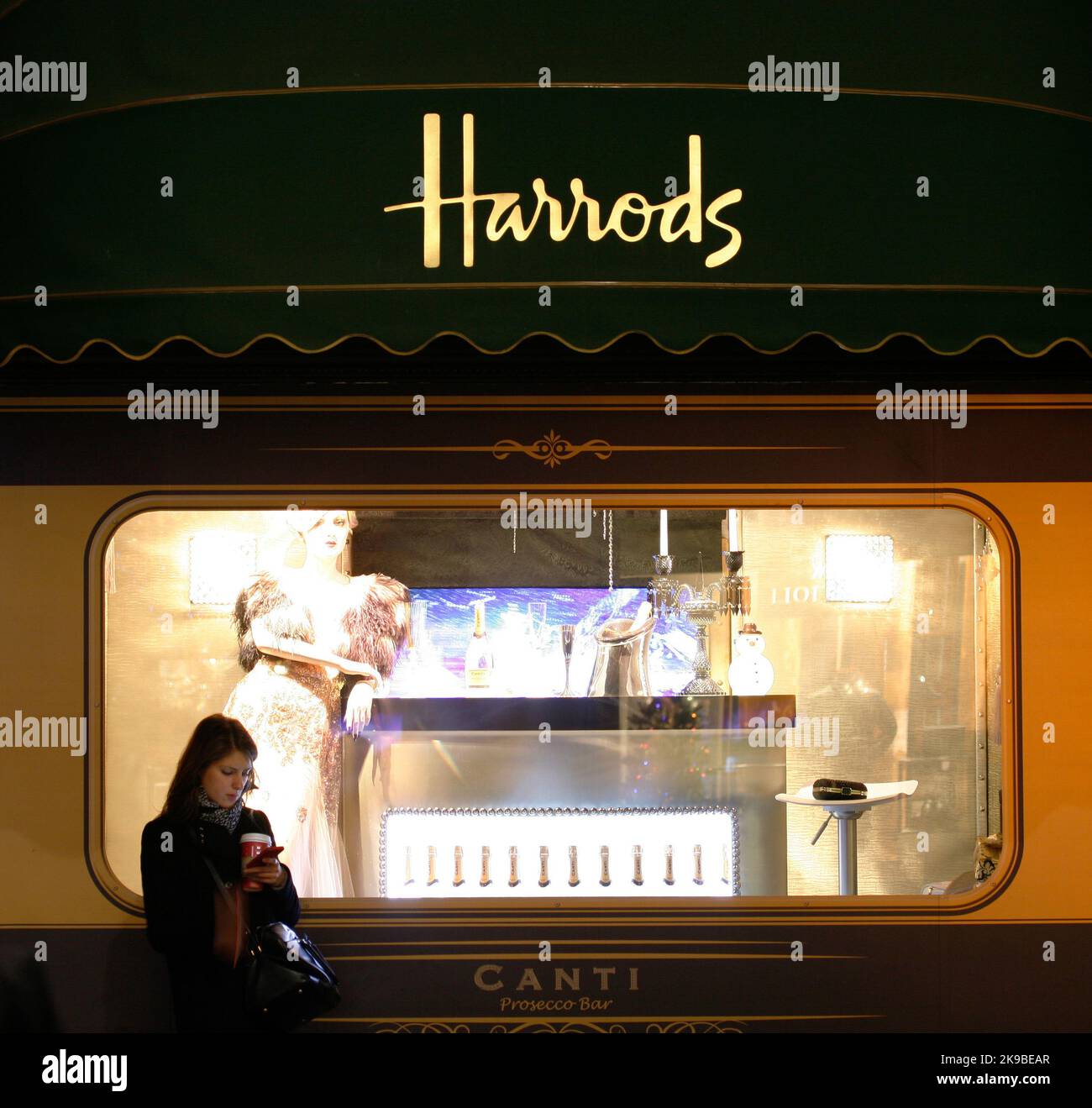 London, UK December 3, 2013 Sign of Harrods Department, located in Brompton Road. Harrods