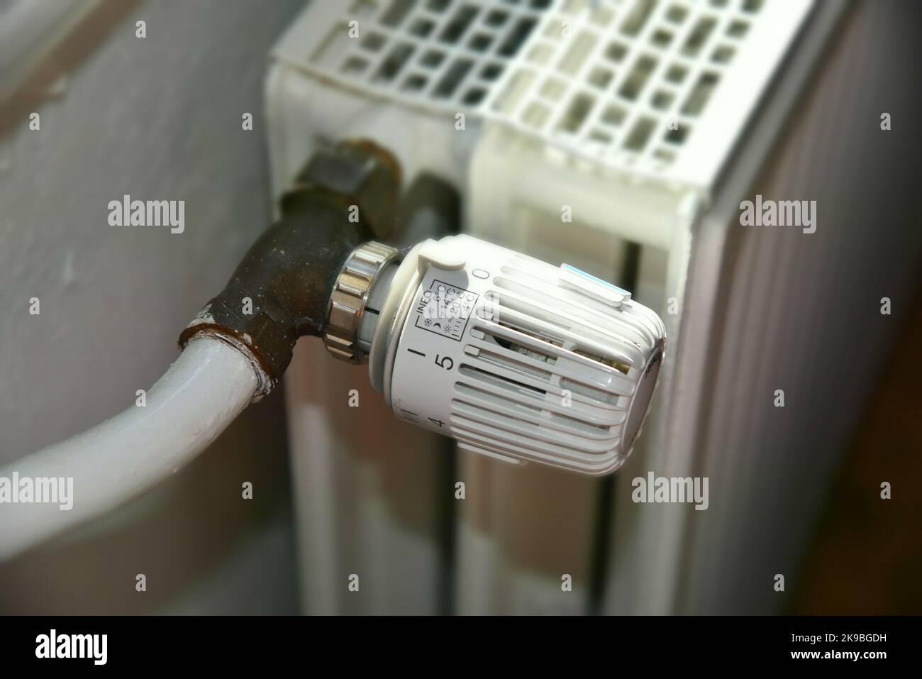 a thermostat on a heater Stock Photo
