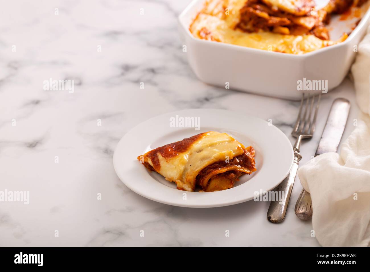 Fresh lasagna with meat and tomato sauce baked in the oven in a ceramic dish Stock Photo Alamy