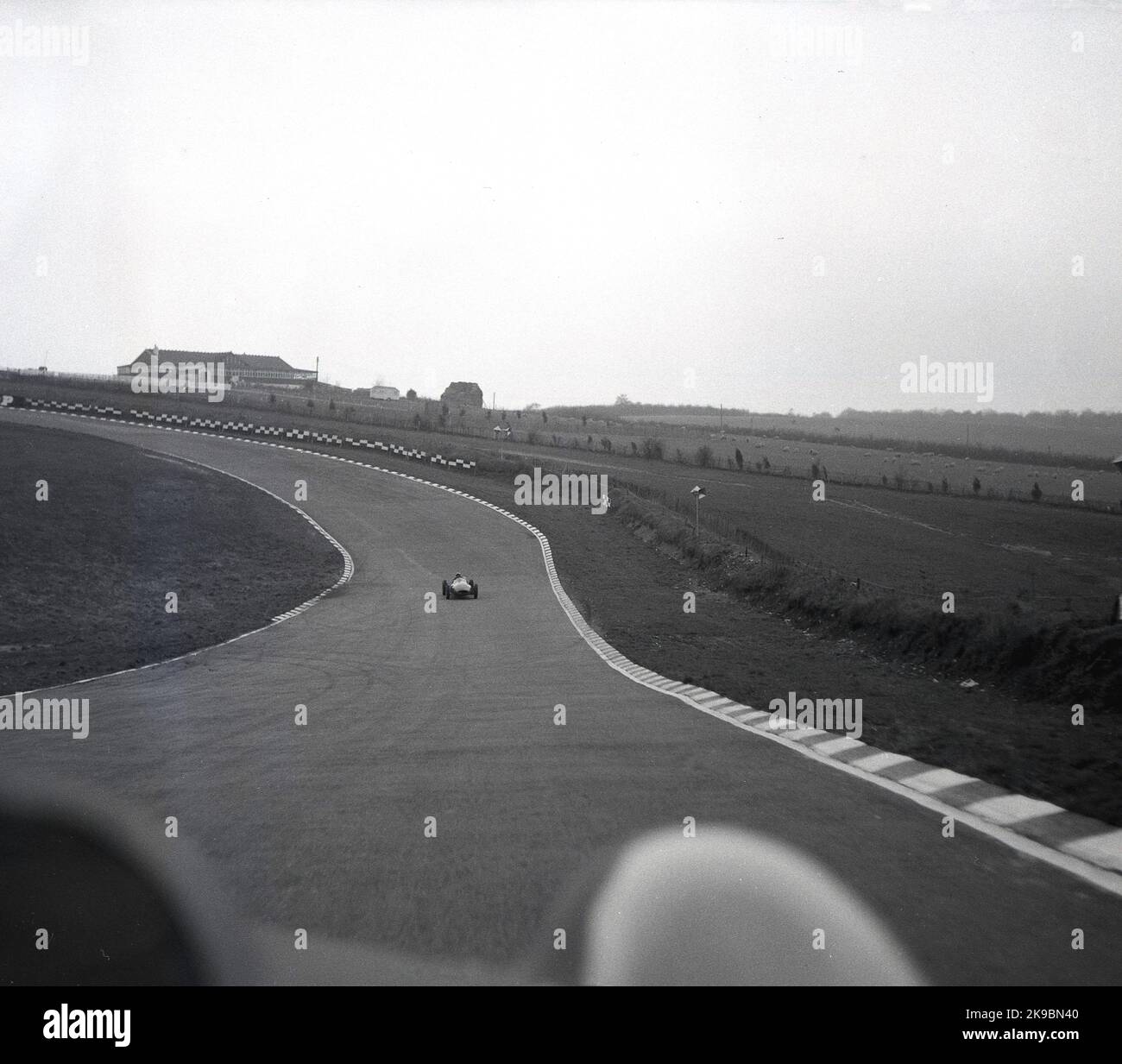 1959, historical, Cooper's Racing School, Brands Hatch, Kent, England, UK, racing car on circuit, coming down straight Stock Photo