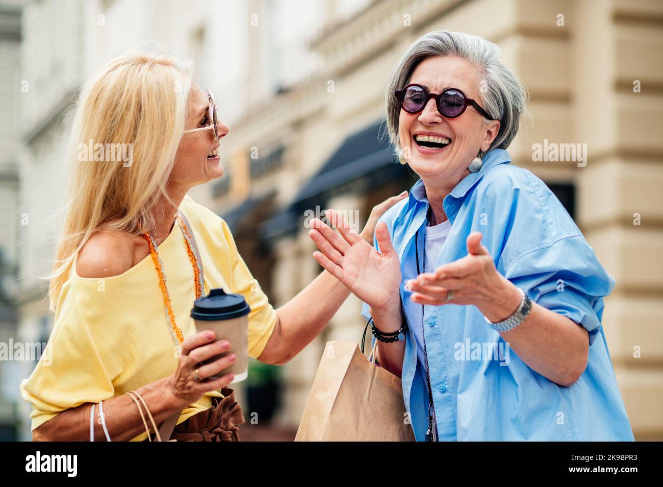 Beautiful happy senior women meeting outdoors and shopping in the city  centre - Pretty and joyful old female adult people bonding and having fun  outdo Stock Photo - Alamy