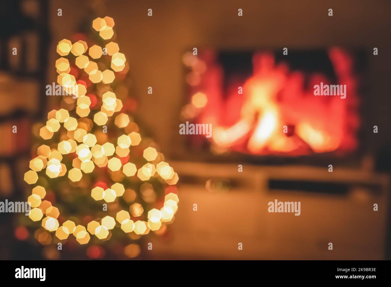 Blurred Christmas room with tree and bokeh lighting. New year concept and background Stock Photo