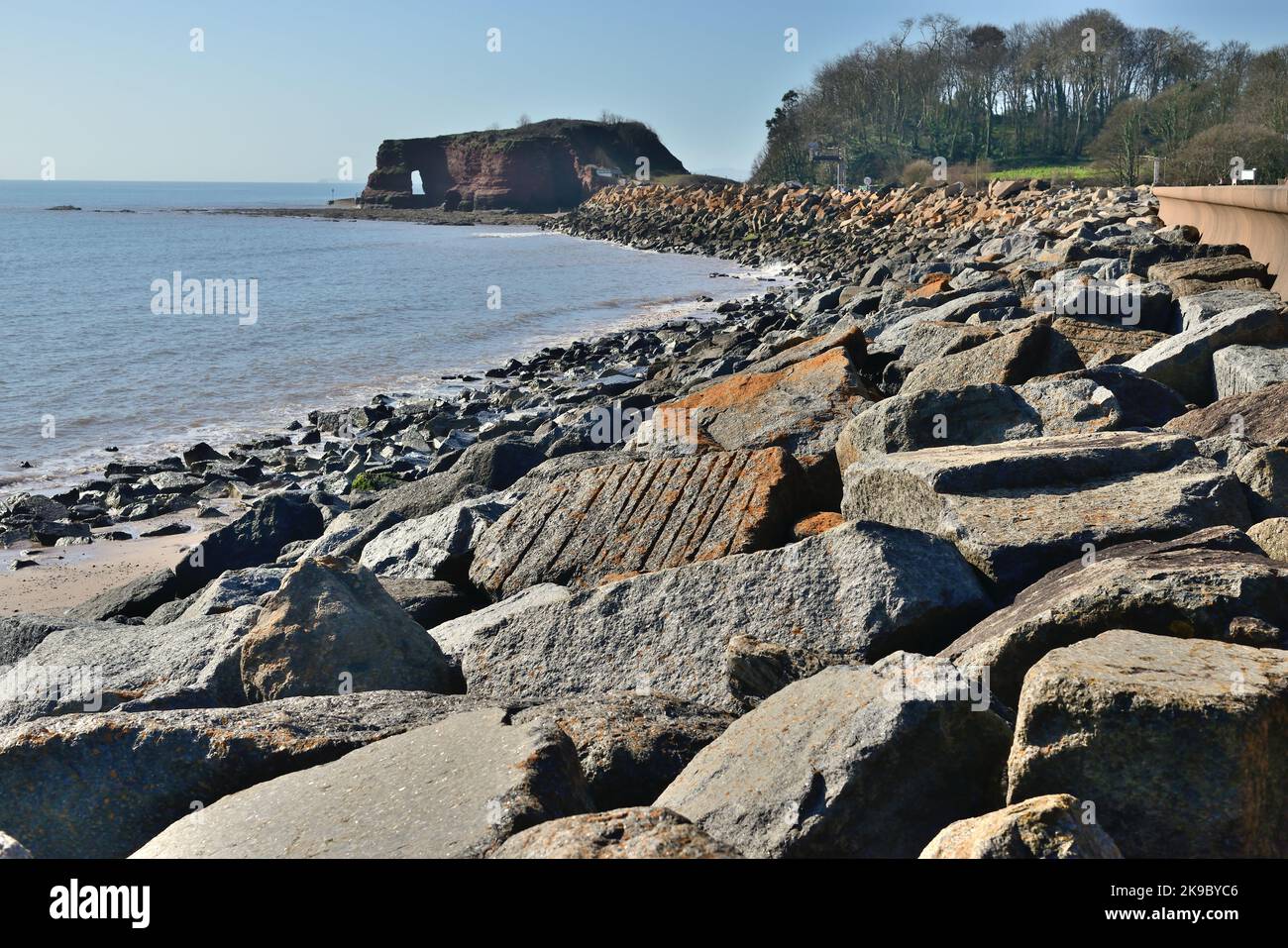 Rock armour along the seawall at Dawlish Warren, looking towards