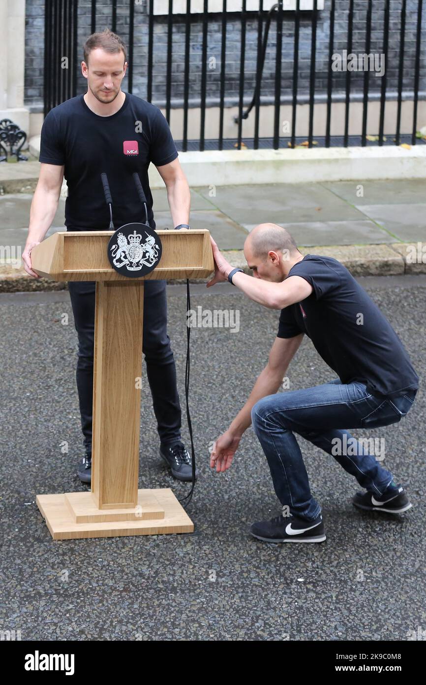 Steve Using Lectern London, UK. 25th Oct, 2022. Members of the Downing Street staff set up ...