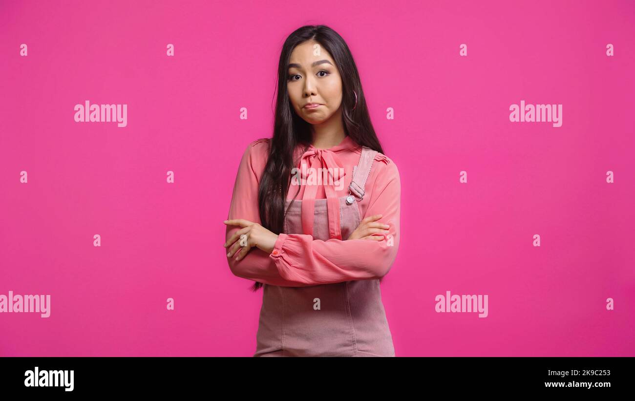 Displeased asian woman standing hi-res stock photography and images - Alamy