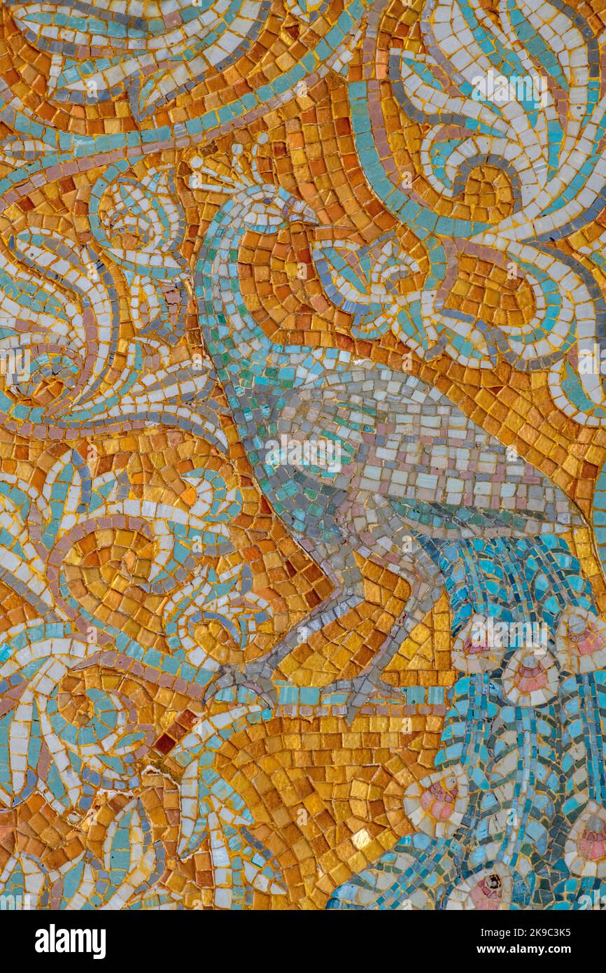 mosaic of exotic bird with trees and foliage on a church wall in zante town zakyntyhos, greece Stock Photo