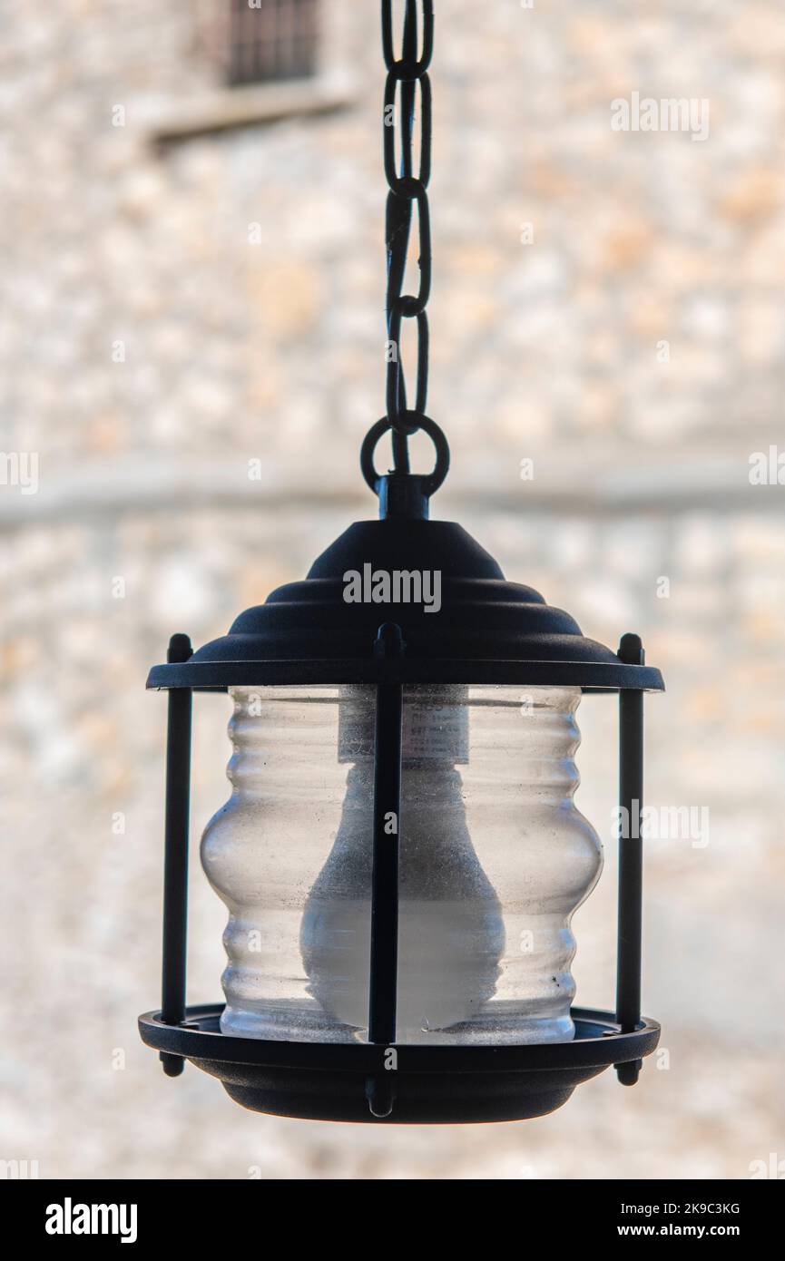 old fashioned lantern, hanging lantern, lantern suspended from a chain