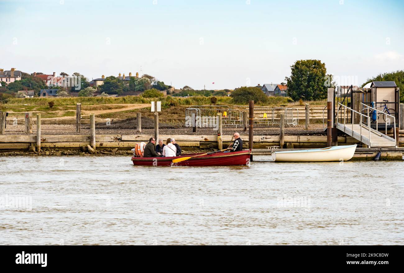 People being rowed across river Blyth in ferry boat, Southwold suffolk 2022 Stock Photo