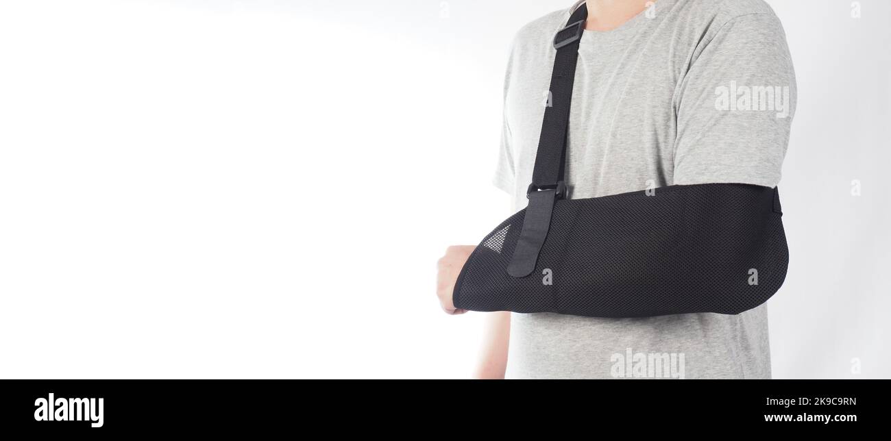 Broken arm. Arm Sling therapy support and covered around elbow first