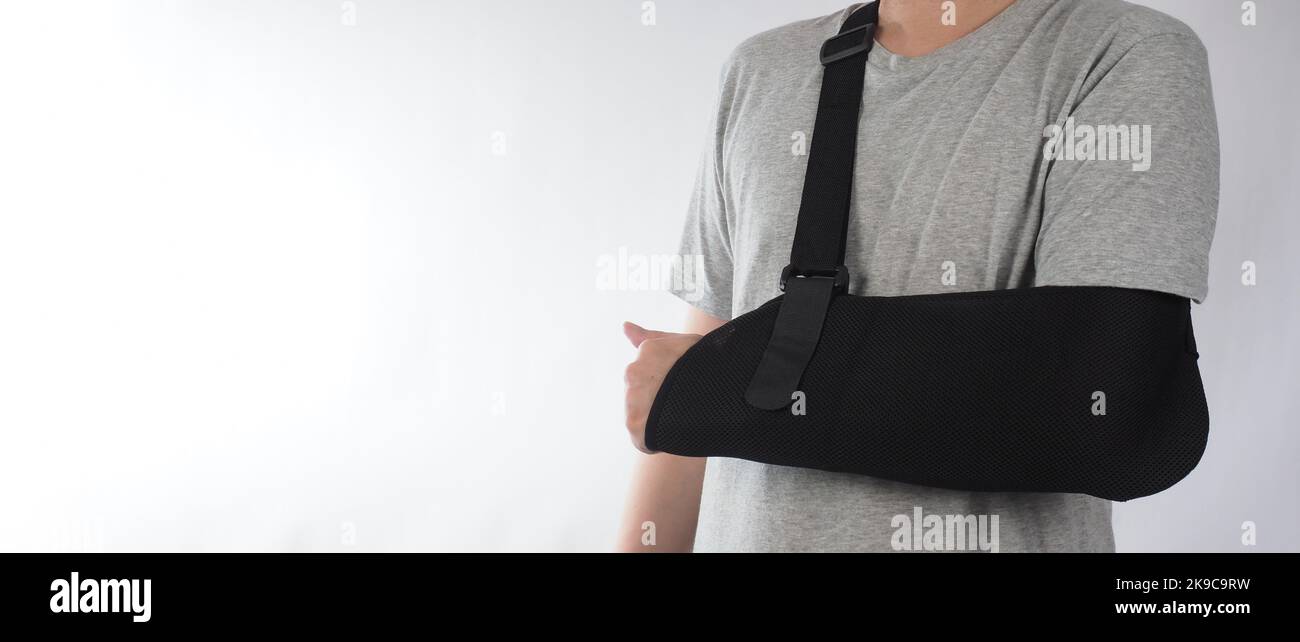 Broken arm. Arm Sling therapy support and covered around elbow first