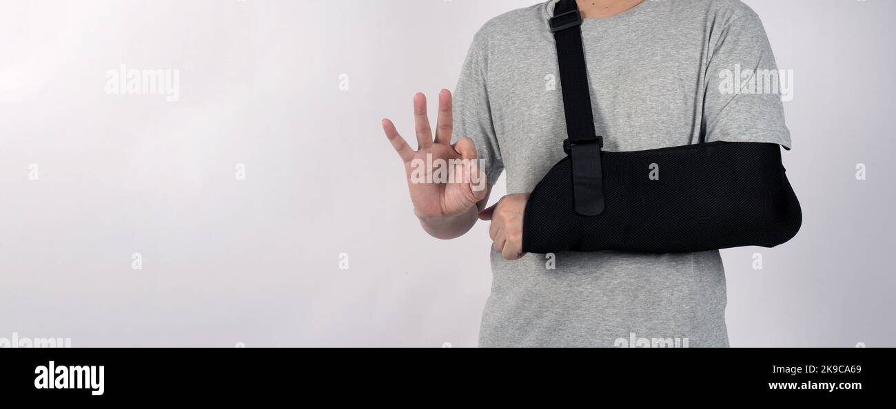 Broken arm. Arm Sling therapy support and covered around elbow first