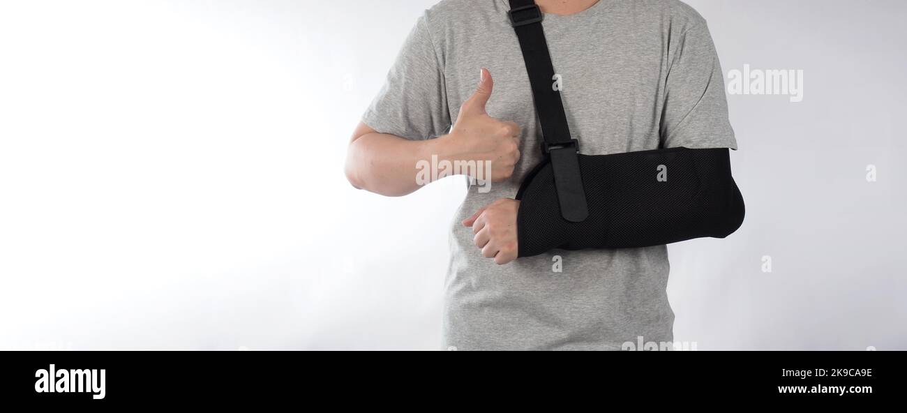 Broken arm. Arm Sling therapy support and covered around elbow first