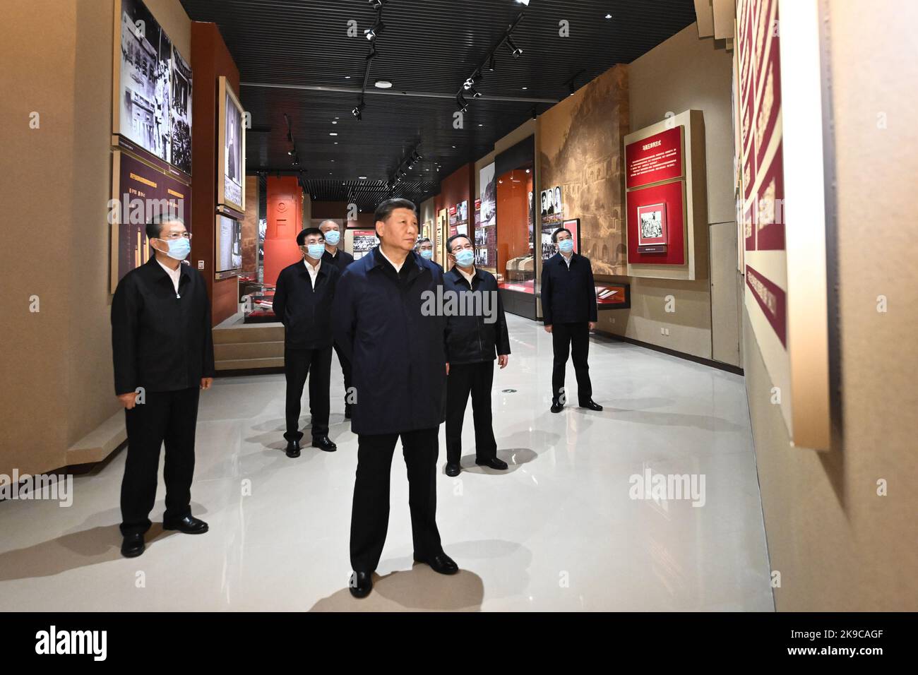 (221027) -- YAN'AN, Oct. 27, 2022 (Xinhua) -- Xi Jinping visits an exhibition on the 13 years of the Communist Party of China (CPC) Central Committee in Yan'an at the Yan'an Revolutionary Memorial Hall in Yan'an, northwest China's Shaanxi Province, Oct. 27, 2022. Xi Jinping, general secretary of the CPC Central Committee, led members of the Standing Committee of the CPC Central Committee Political Bureau on Thursday to visit Yan'an, an old revolutionary base in northwest China's Shaanxi Province. Xi, also Chinese president and chairman of the Central Military Commission, was accompanied by Cre Stock Photo