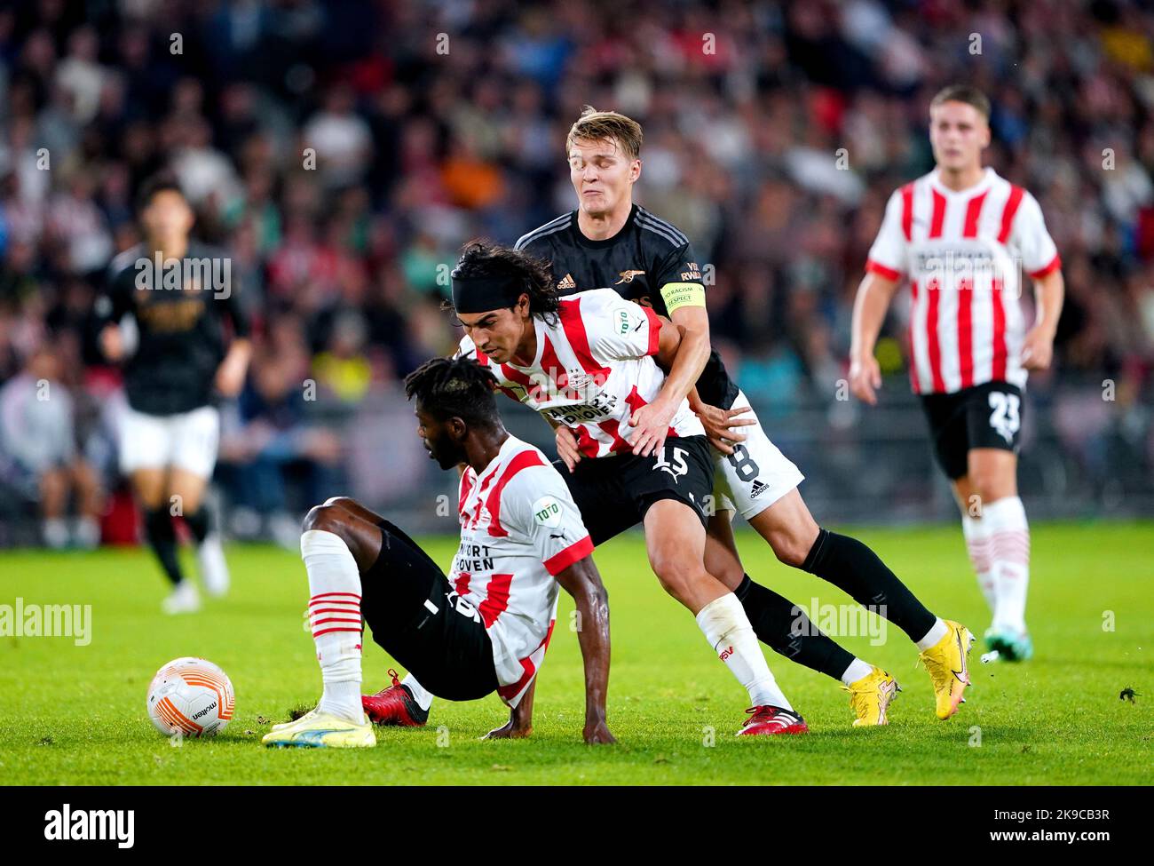 Arsenal's Martin Odegaard (right) and PSV Eindhoven's Erick Gutierrez battle for the ball during the UEFA Europa League Group A match at The Philips Stadium, Eindhoven. Picture date: Thursday October 27, 2022. Stock Photo