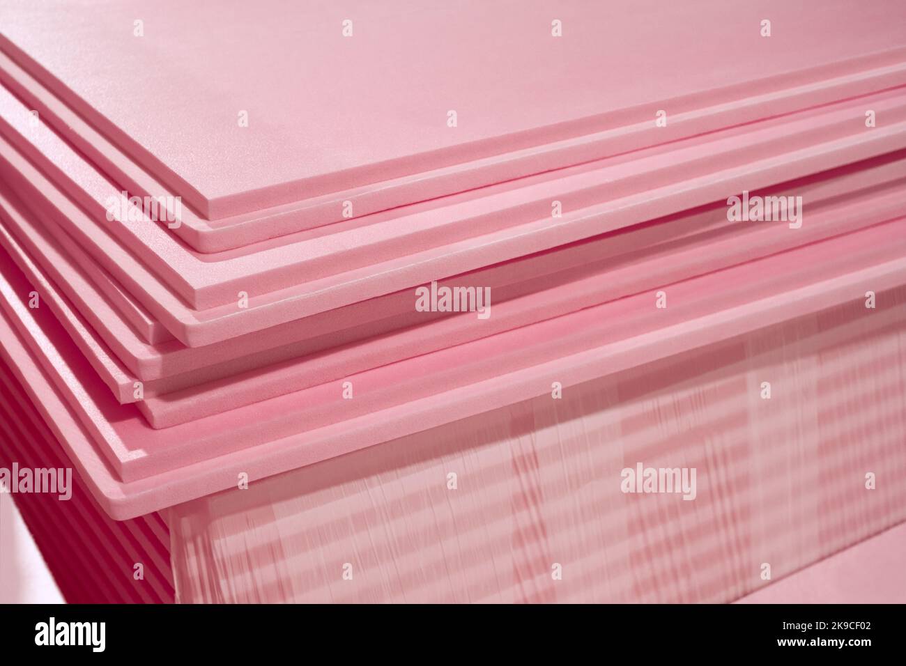 Pink Extruded Polystyrene XPS foam thermal insulation boards stacked in