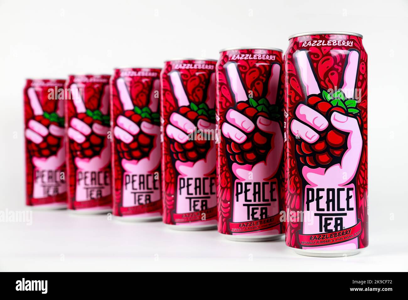 The Razzleberry Peace tea cans are produced by CocaCola Stock Photo