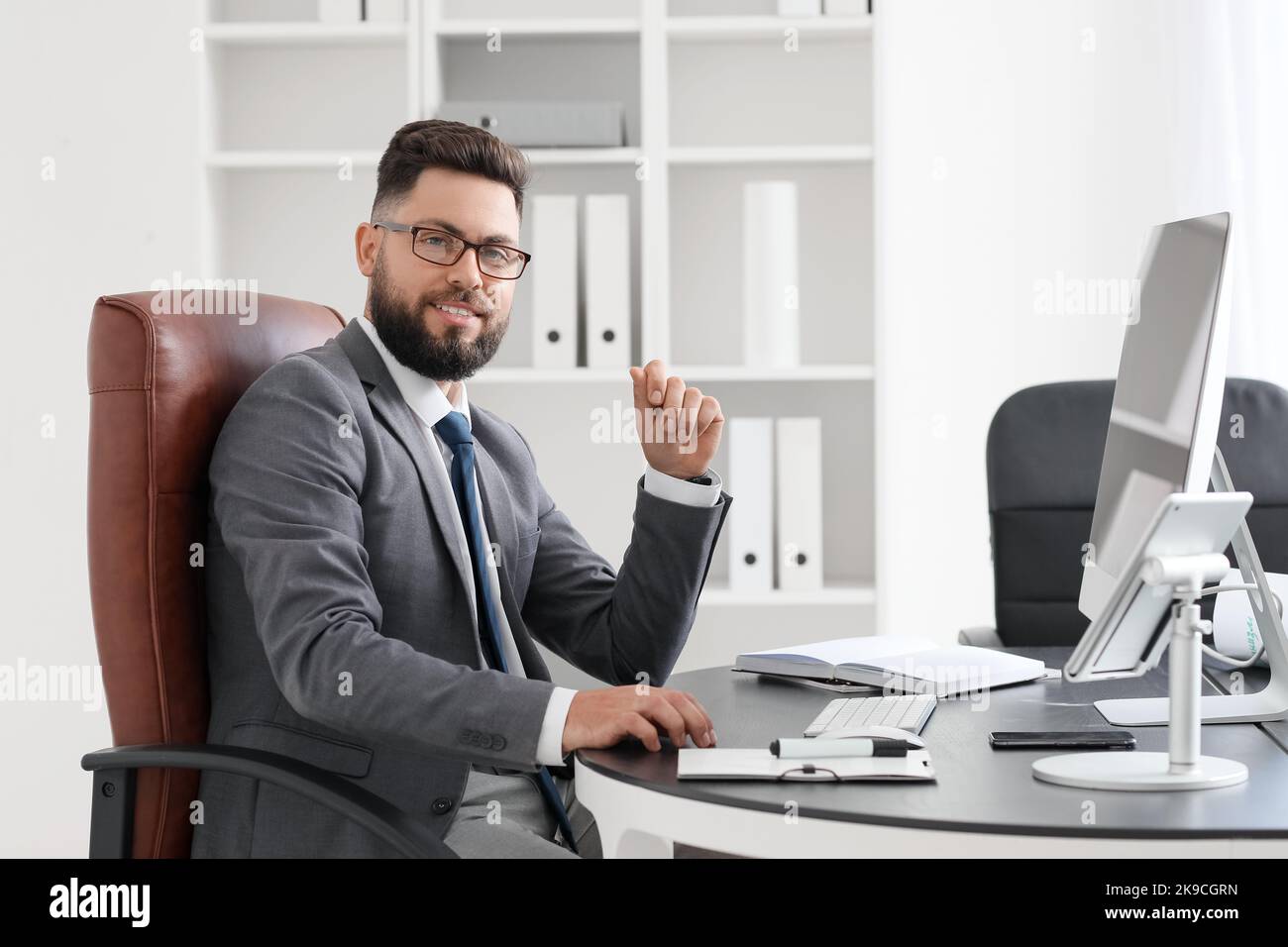 Portrait smiling banker table hi-res stock photography and images - Alamy