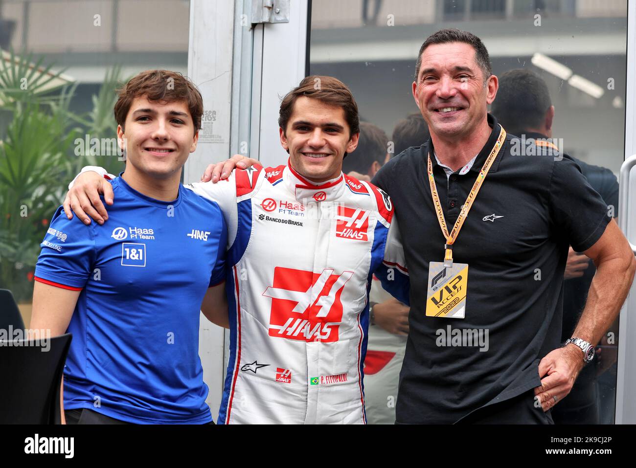 Mexico City, Mexico. 27th Oct, 2022. (L to R): Enzo Fittiapldi (BRA) Ferrari Academy Driver with Pietro Fittipaldi (BRA) Haas F1 Team Reserve Driver and Max Papis (ITA). Mexican Grand Prix, Thursday 27th October 2022. Mexico City, Mexico. Credit: James Moy/Alamy Live News Stock Photo