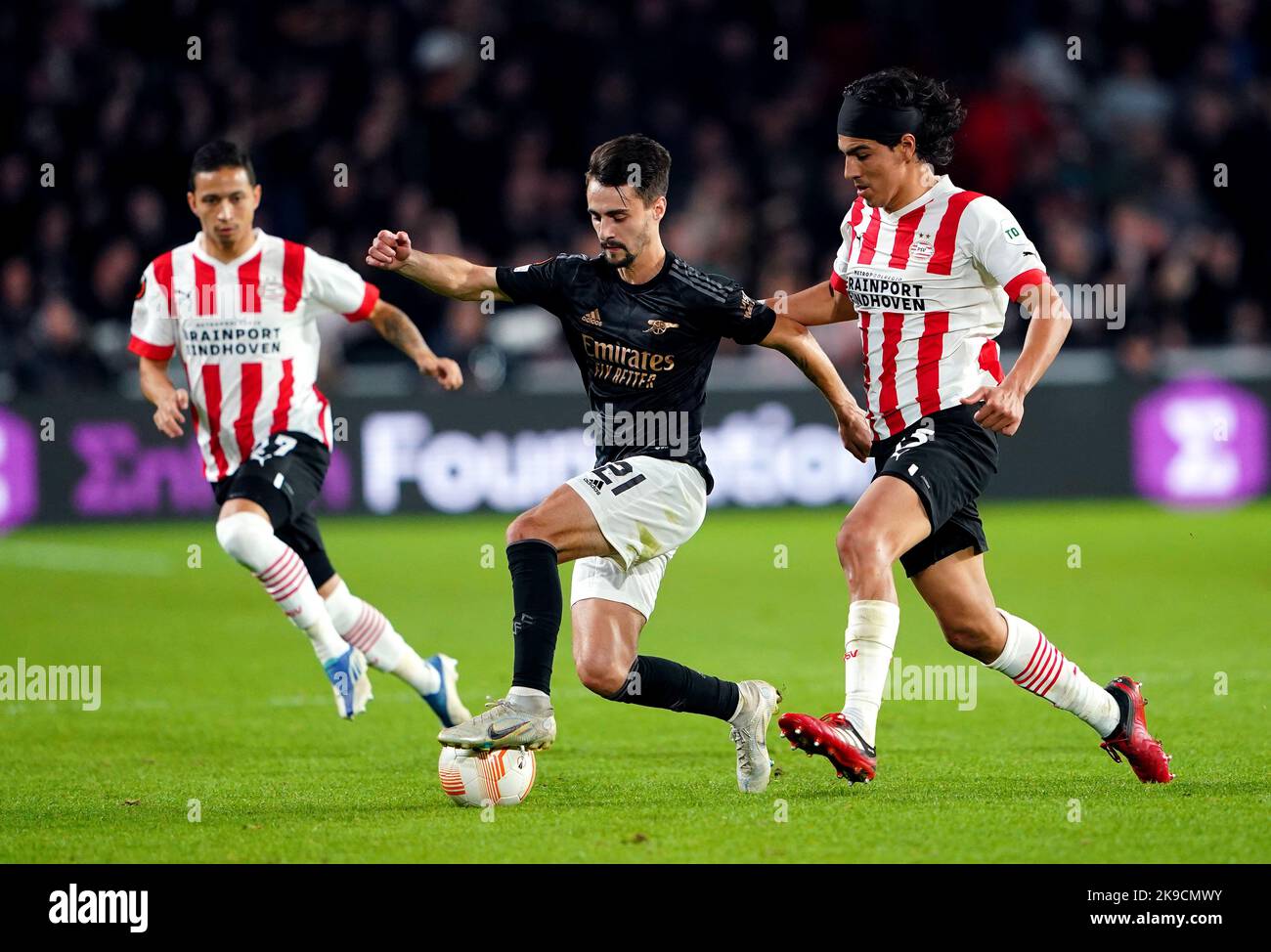 Arsenal's Fabio Vieira (centre) and PSV Eindhoven's Erick Gutierrez battle for the ball during the UEFA Europa League Group A match at The Philips Stadium, Eindhoven. Picture date: Thursday October 27, 2022. Stock Photo