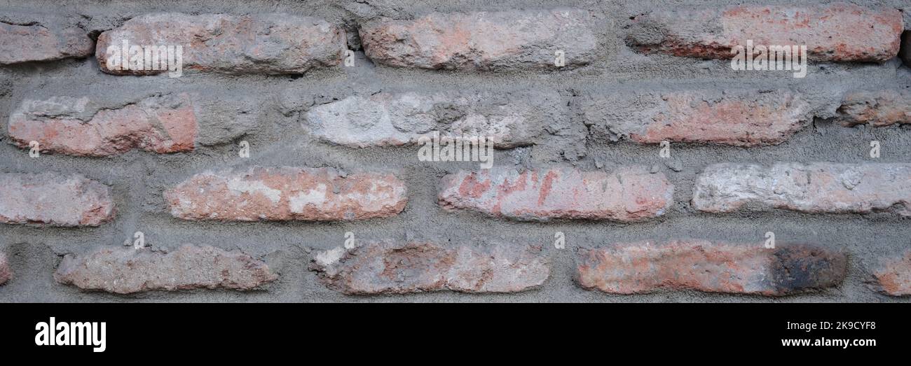 Old brick wall with shadow texture can be used as closeup Stock Photo