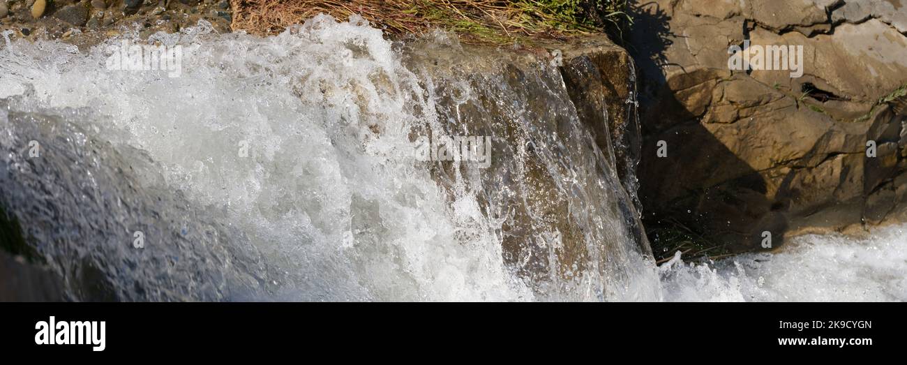 Cascade of waterfalls among the stones closeup Stock Photo