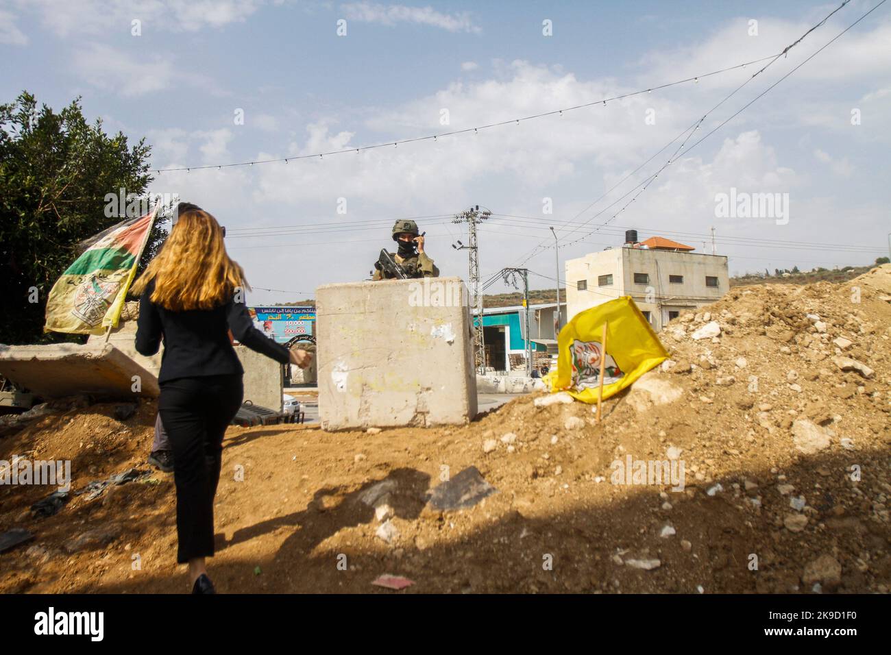Nablus, Palestine. 26th Oct, 2022. An Israeli soldier seen guarding a ...
