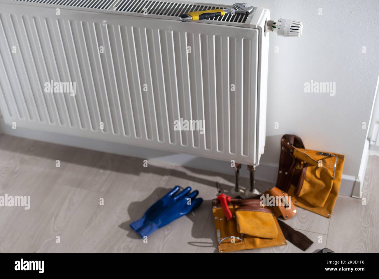 tools on the radiator close up Stock Photo - Alamy