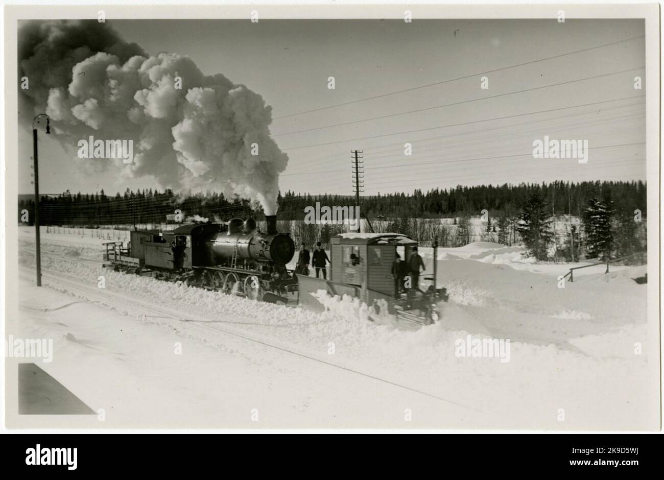 The State Railways, SJ Vingplog in work at the Bangården in Jämtlands Sikås in the winter of 1936.Obs! The plow's 'nose wing' is precipitated. Stock Photo