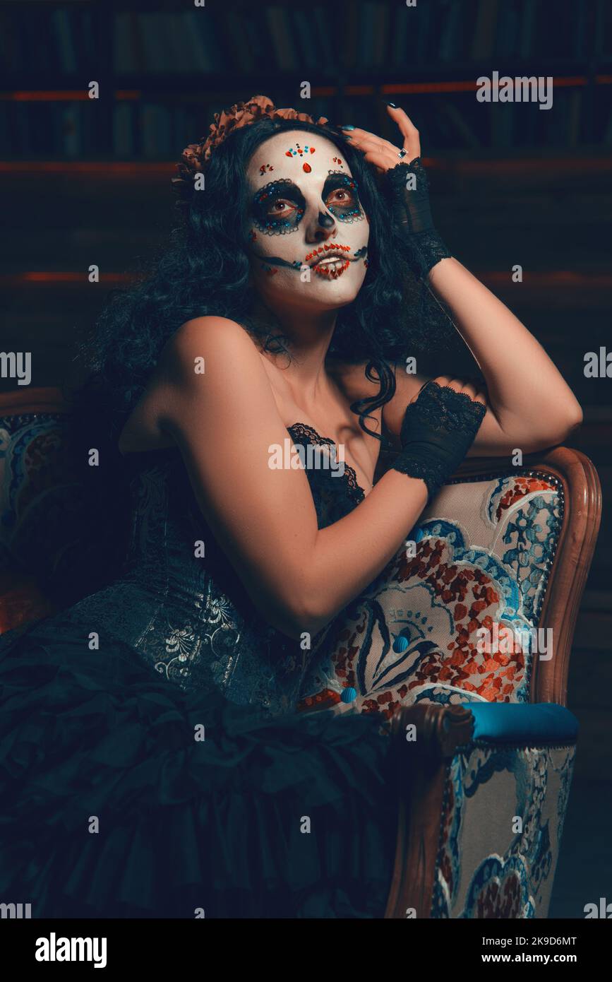 Day of the Dead. Dia de los muertos. Santa Muerte. Woman with sugar skull makeup. Calavera Catrina. Halloween Stock Photo